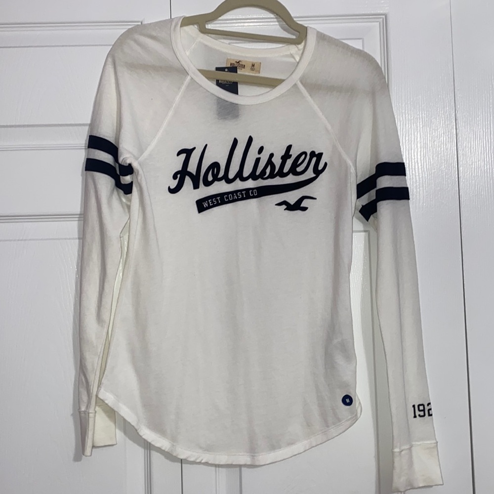 Hollister long sleeve shirt Size medium Color white and black.